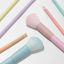 A full set of makeup tools including 7 colored makeup brushes, loose powder, contouring, eyeshadow, eyebrow brushes, etc